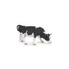 Figurine vache noire et blanche broutant - Papo